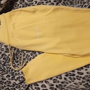 NWT ALPHALETE Canary Yellow Drawstring Core Joggers Zipper Pocket Pants New